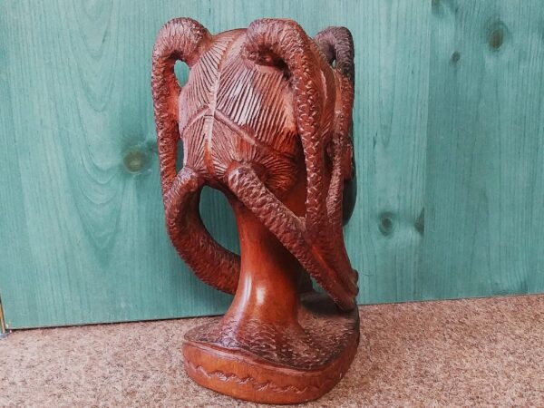 Ebony wood statue woman head
